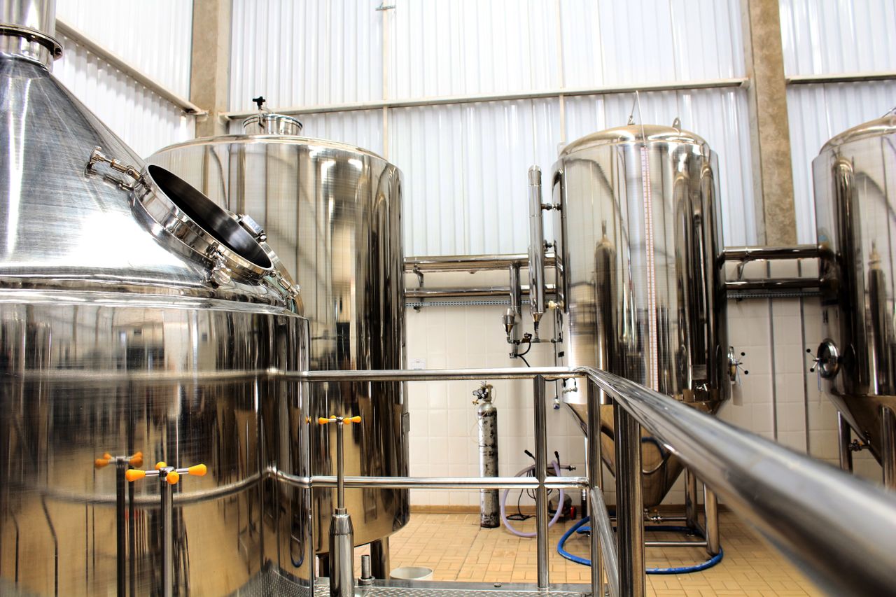 Stainless steel brewing tanks and food-grade piping